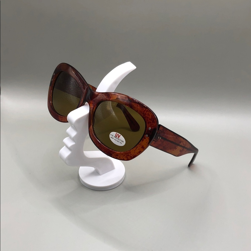 Vintage 80's 90's brown amber color semi oversized butterfly sunglasses.